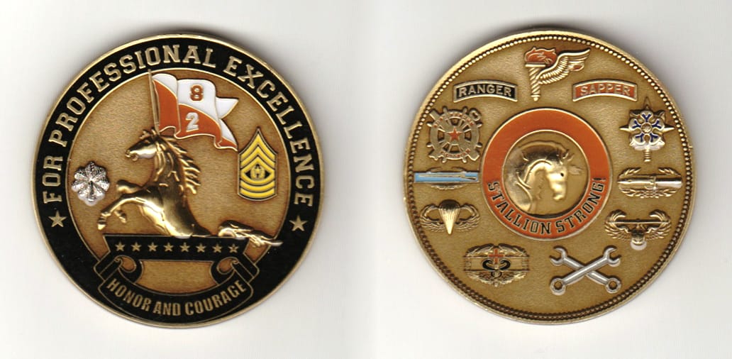 Round shaped, brass colored coin 2 inches in diameter.