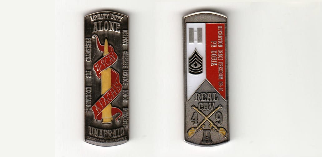 Retangular shaped with bowed top and bottom edges, pewter  colored coin 7/8 inches wide x 2-1/4 inches high.