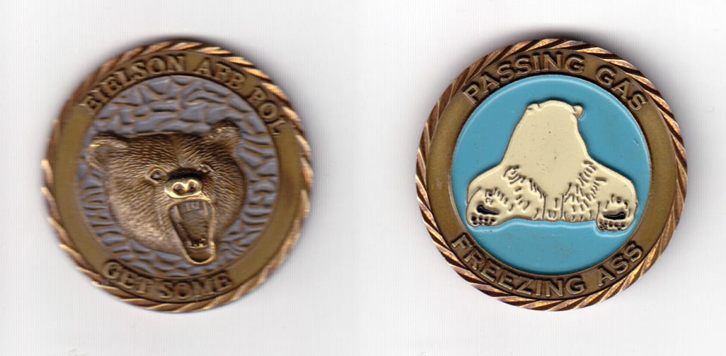 Round shaped, antique brass colored coin 1-1/2 inches in diameter.