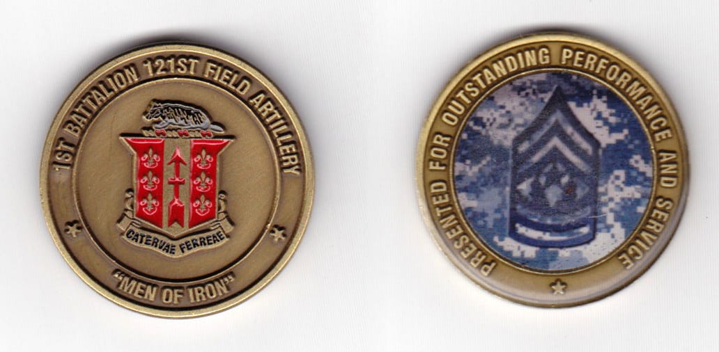 Round shaped, antique brass colored coin 1-5/8 inches in diameter.