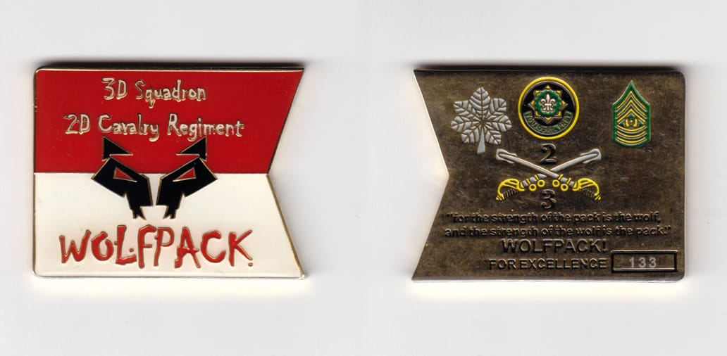 Guidon shaped, gold  colored coin 2 inches wide x 1-1/2 inches high.