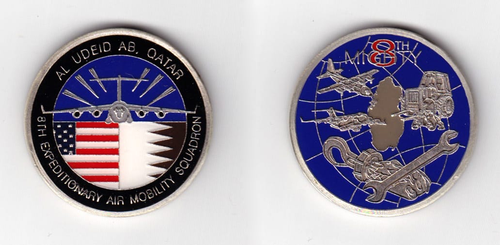 Round shaped, pewter colored coin 1-3/4 inches in diameter.