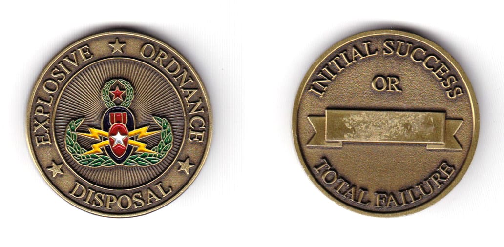 Round shaped, brass colored coin 1-5/8 inches in diameter.