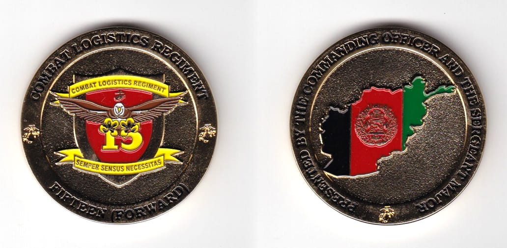 Round shaped, gold colored coin 1-3/4 inches in diameter.