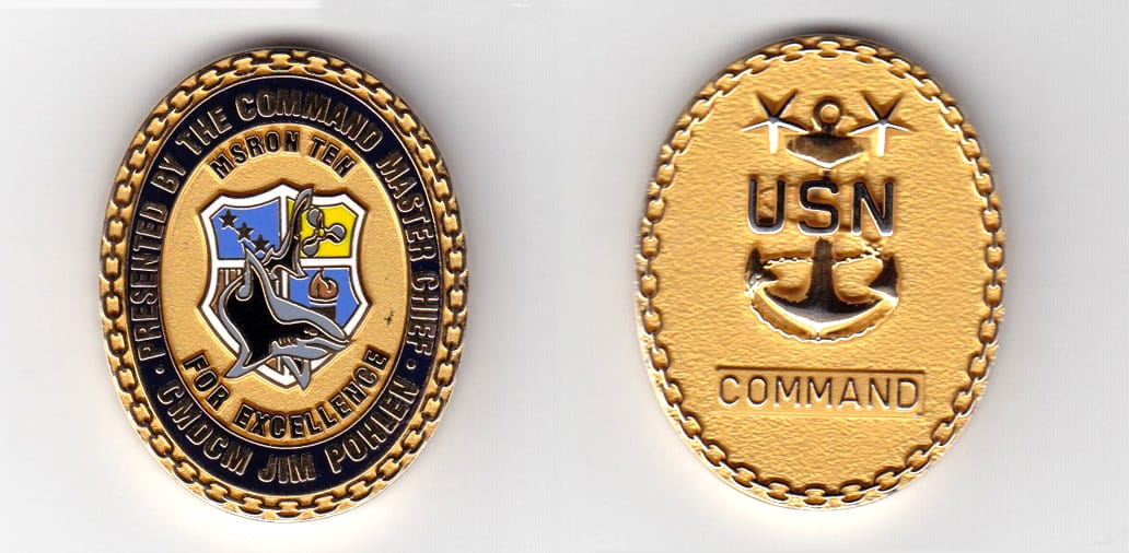 Oval shaped, brass  colored coin 1-3/8 inches wide x 1-3/4 inches high.