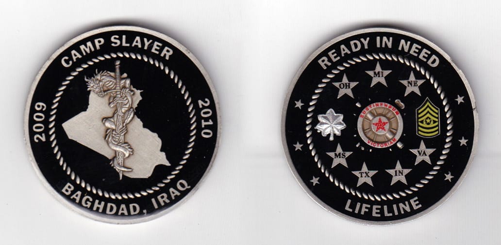 Round shaped, pewter colored coin 1-3/4 inches in diameter.