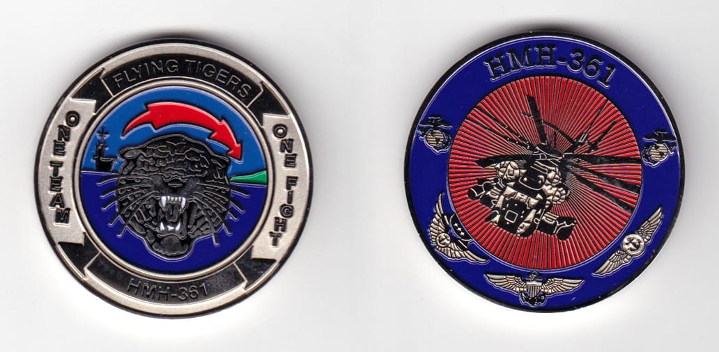 Round shaped, silver colored coin 1-3/4 inches in diameter.