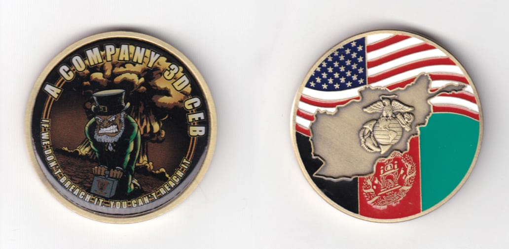 Round shaped, brass colored coin 1-3/4 inches in diameter.