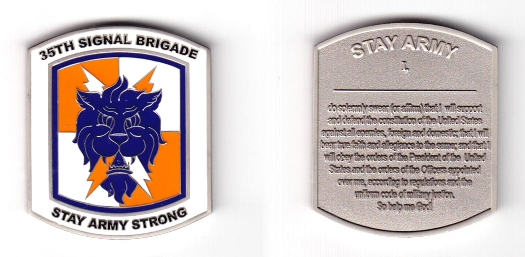 Retangular shaped, with top and bottom edges bowed, pewter  colored coin 1-5/8 inches wide x 2 inches high.