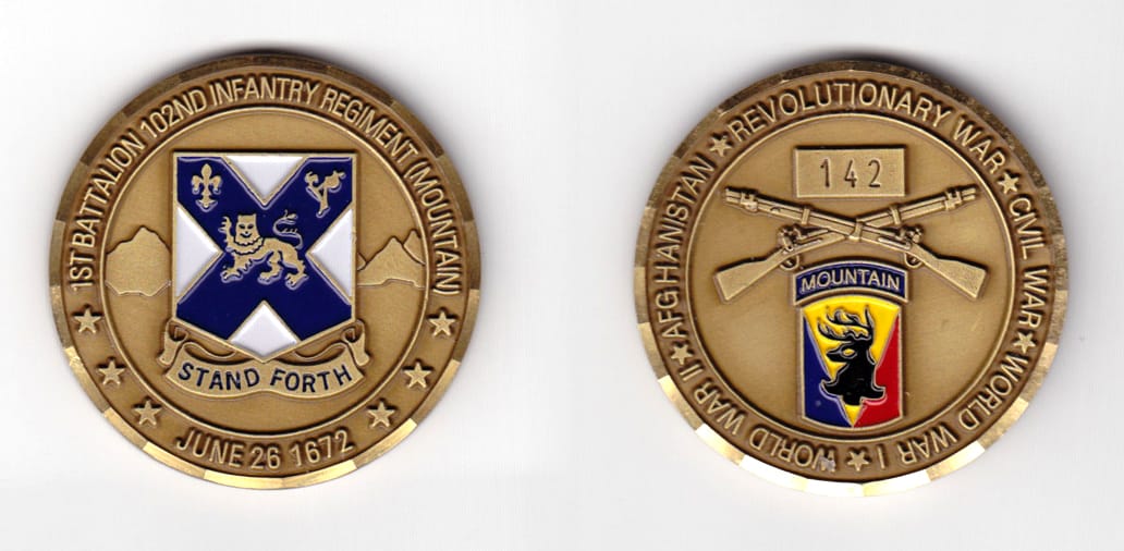 Round shaped, antique brass colored coin 2 inches in diameter.