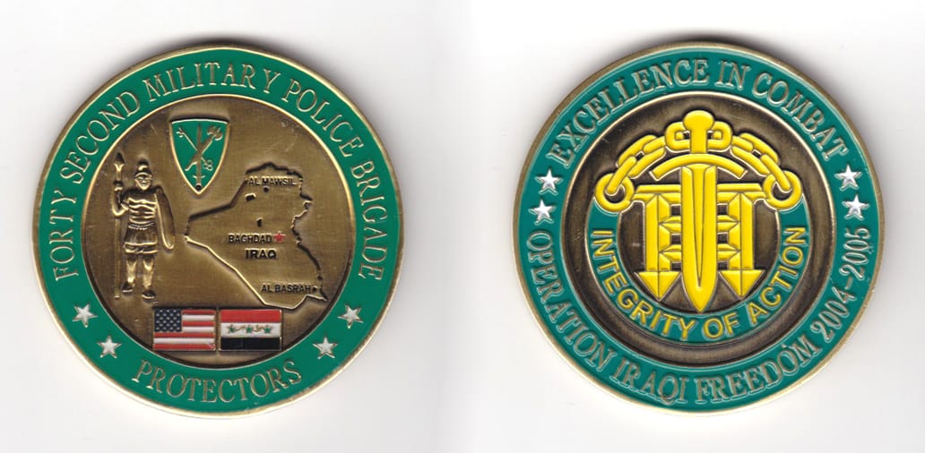 Round shaped,  brass colored coin 2 inches in diameter.