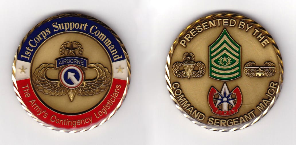 Round shaped,  brass colored coin 2 inches in diameter.