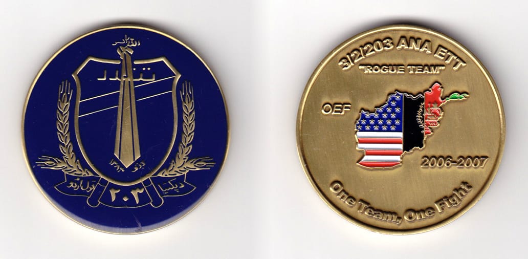 Round shaped,  brass colored coin 2 inches in diameter.