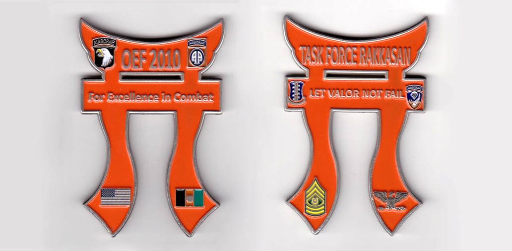 Tori shaped, pewter colored coin, 2-1/8 inches wide x 3 inches high.