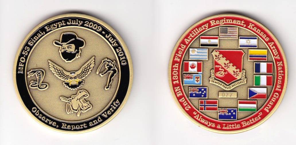 Round shaped, brass colored coin, 2 inches in diameter.