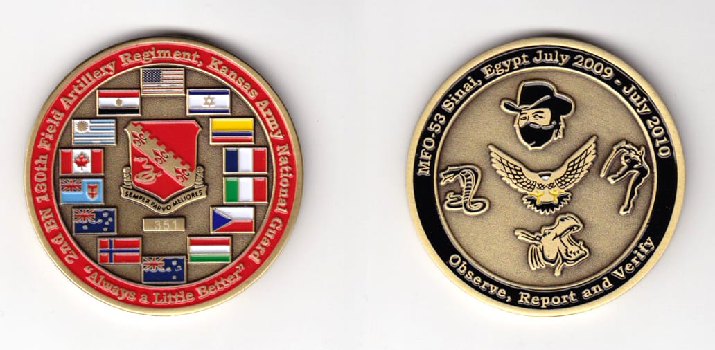 Round shaped, brass colored coin, 2 inches in diameter.