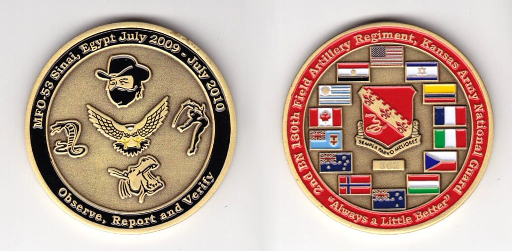 Round shaped, brass colored coin, 2 inches in diameter.