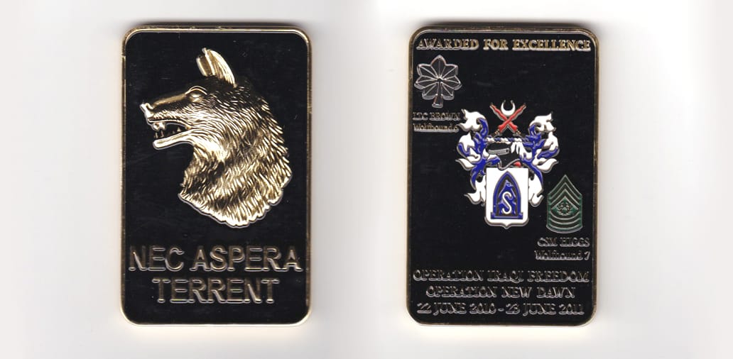 Retangular shaped, gold colored coin, 1-3/4 inches wide x 2-3/4 inches high.