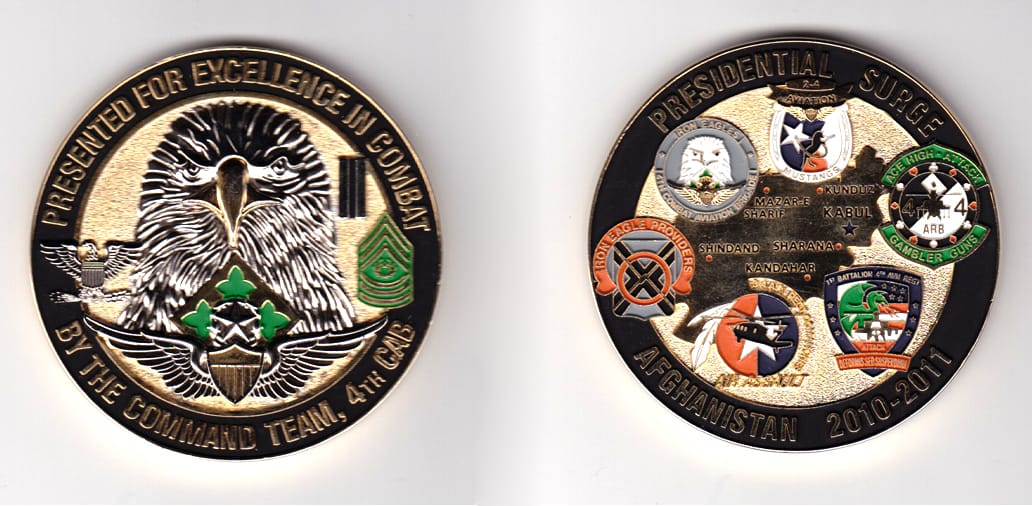 Round shaped, gold colored coin, 2-1/2 inches in diameter.