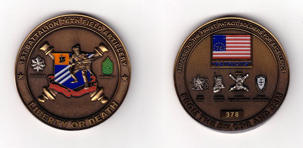 Round shaped, gold colored coin, 2 inches in diameter.