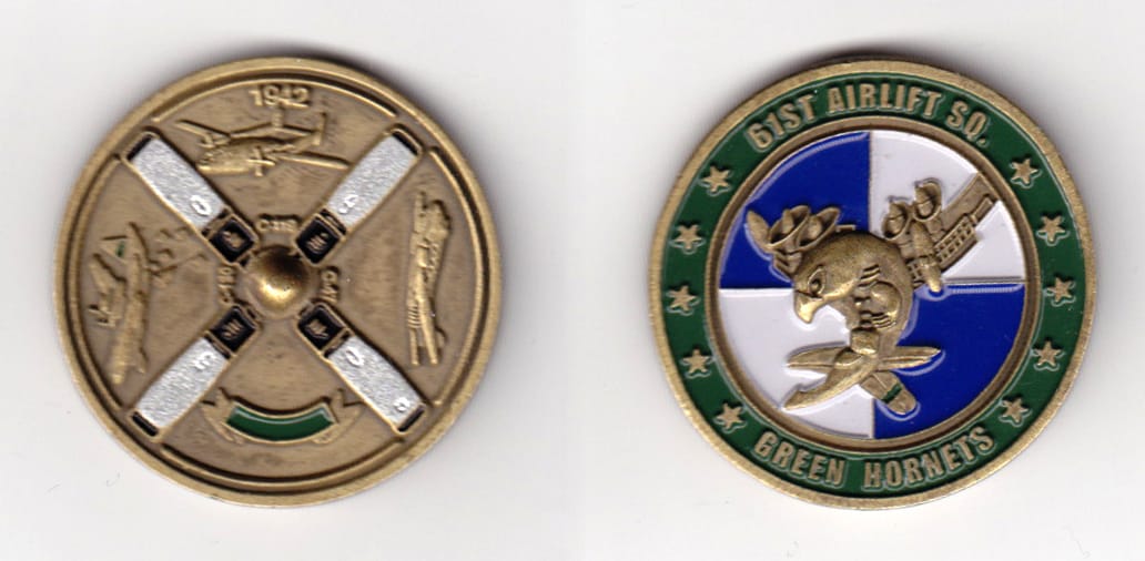 Round shaped, brass colored coin, 1-1/2 inches in diameter.