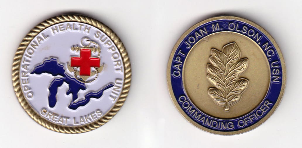 Round shaped, brass colored coin, 1-1/2 inches in diameter.