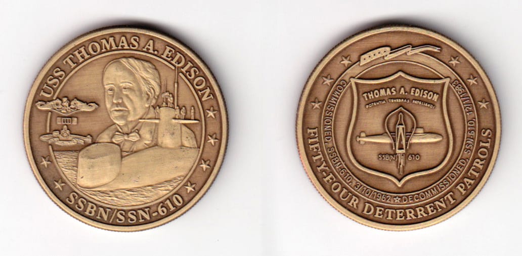 Round shaped, antique brass colored coin, 1-1/2 inches in diameter.