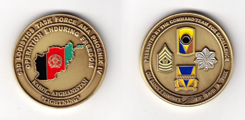 Round shaped, brass colored coin, 1-1/2 inches in diameter.