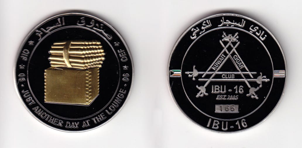 Round shaped, pewter colored coin, 2 inches in diameter.