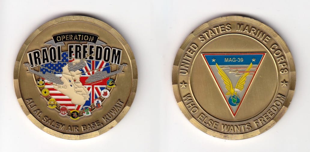 Round shaped, gold colored coin with brass colored rim, 2- 1/8 inches in diameter.