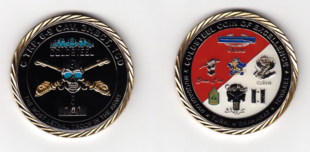 Round shaped, gold colored coin, 2 inches in diameter.