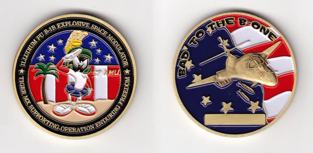 Round shaped, brass colored coin, 2 inches in diameter.