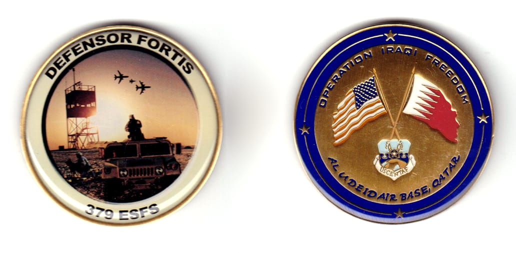 Round shaped, brass colored coin, 2 inches in diameter.