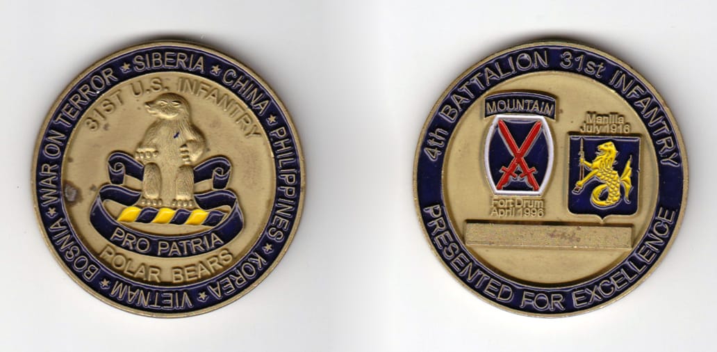 Round shaped, antique brass colored coin 2 inches in diameter.