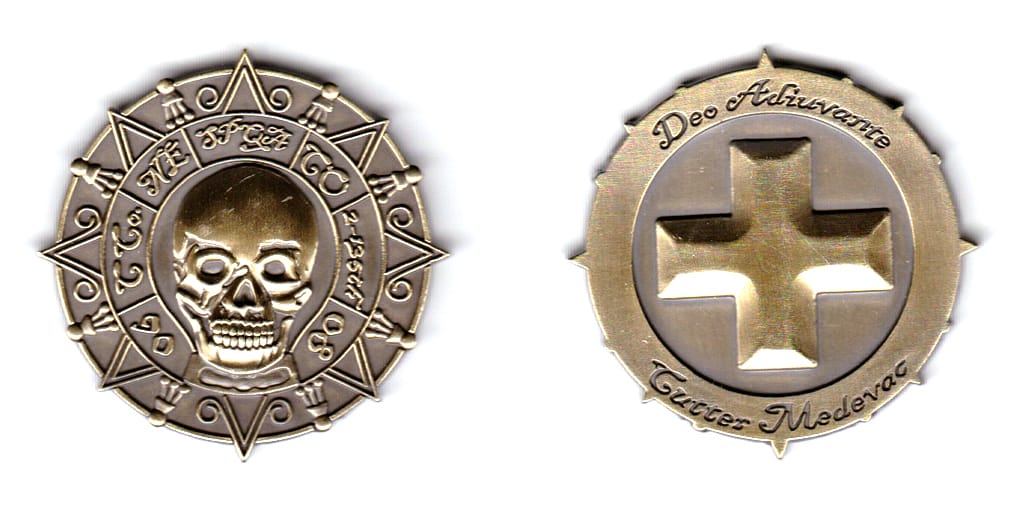 Round shaped, brass colored coin, 2 inches in diameter.