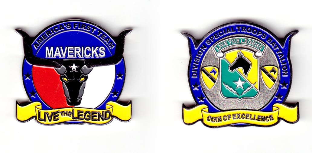 Round shaped, with steer horns protruding on both sides and banner mounted below, silver colored coin, 2-1/4 inches wide...