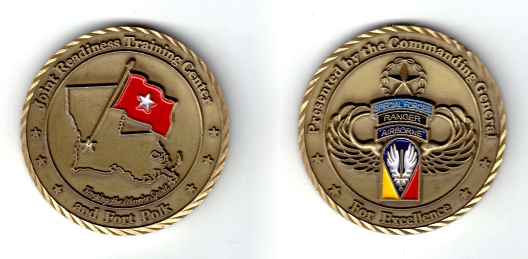 Round shaped, brass colored coin, 2 inches in diameter.