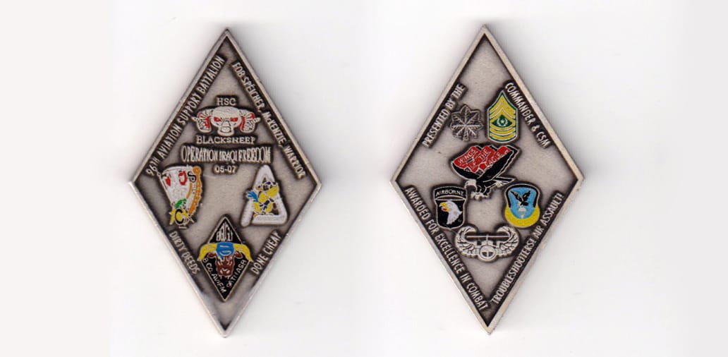 Diamond shaped, gold colored coin, 1-1/4 inches wide x 2 inches high.