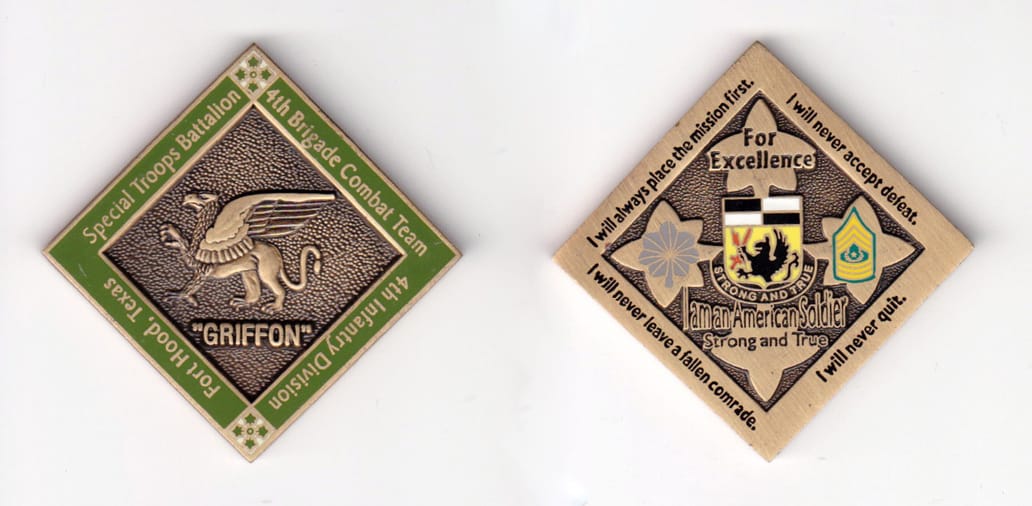 Diamond shaped, brass colored coin, 2 inches wide x 2 inches high.