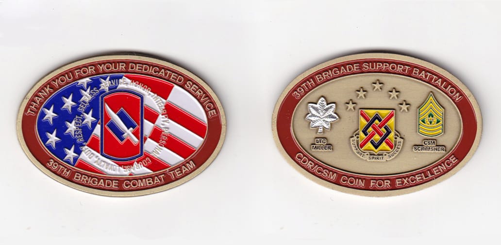 Oval shaped, brass colored coin, 2-1/2 inches wide x 1-7/8 inches high.