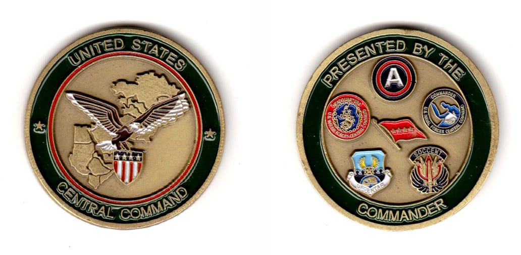 Round shaped, brass colored coin, 1-1/2 inches in diameter.