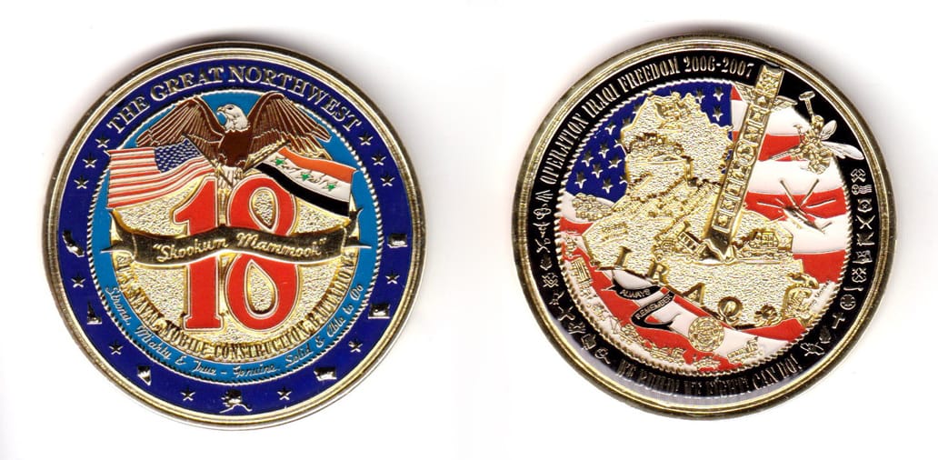 Round shaped, gold colored coin, 2 inches in diameter.