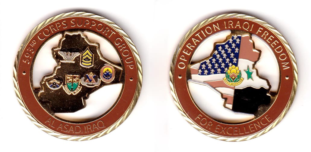 Round shaped, gold colored coin, 2 inches in diameter.