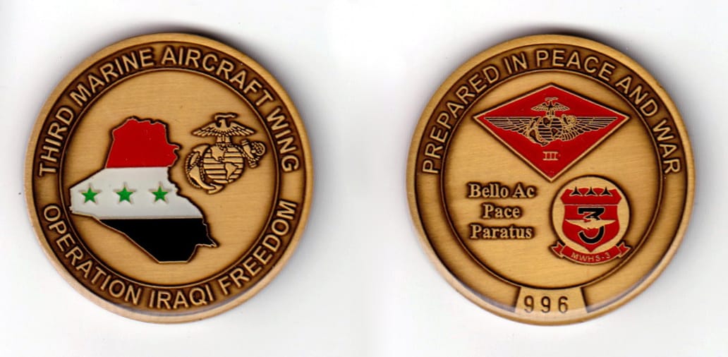 Round shaped, antique gold colored coin, 2 inches in diameter.