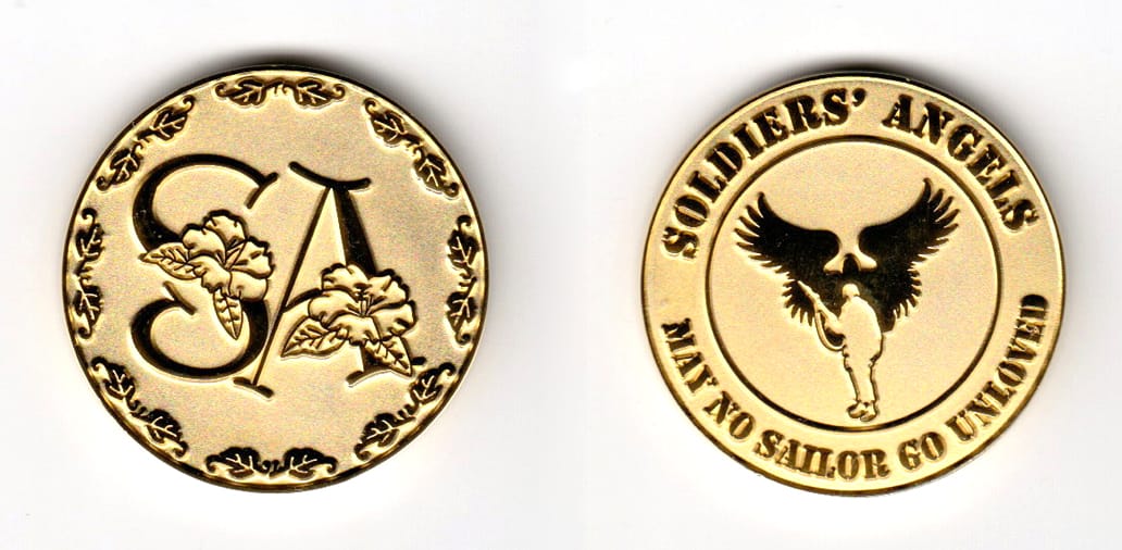 Round shaped, brass colored coin, 2 inches in diameter.