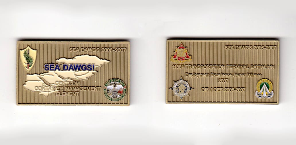 Retangular shaped, brass colored coin, 2-1/4 inches wide x 1-1/4 inches high.