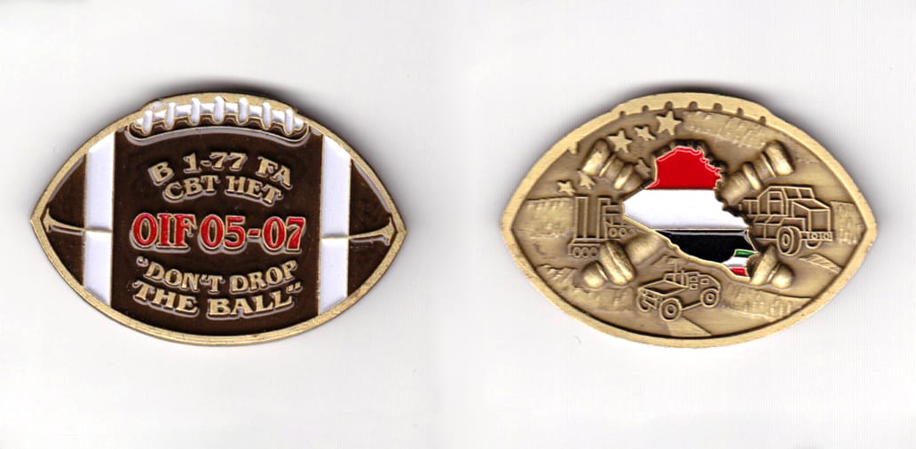 Football shaped, brass colored coin, 2 inches wide x 1-1/4 inches high.