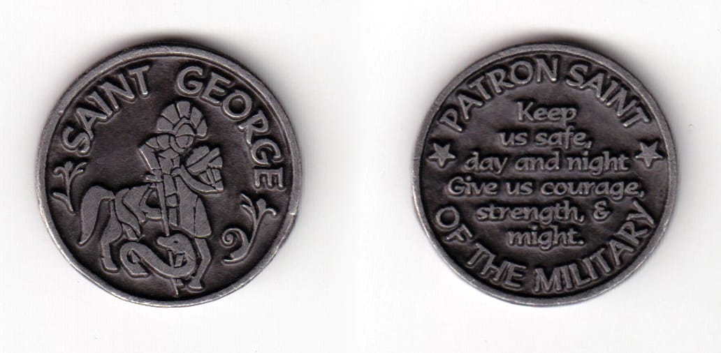 Round shaped, pewter colored coin, 1-1/8 inches in diameter.