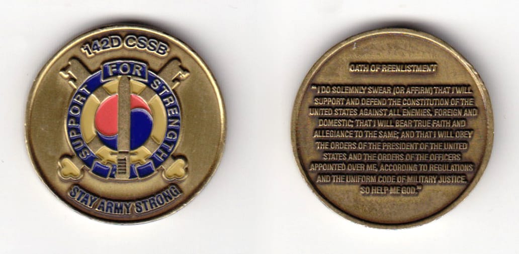 Round shaped, brass colored coin, 1-1/4 inches in diameter.