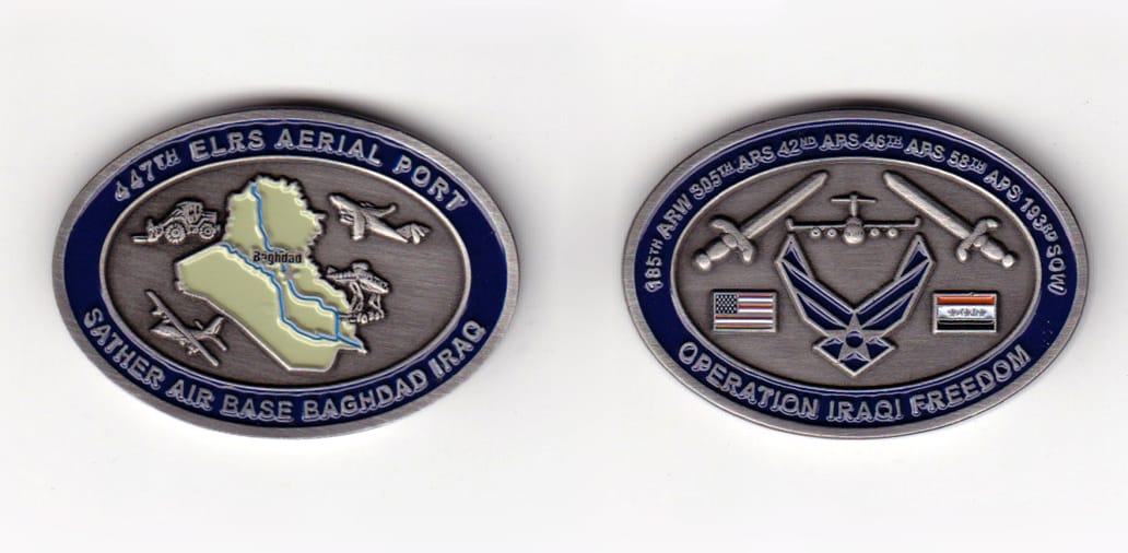 Oval shaped, pewter colored coin, 1-3/4 inches wide x 1-1/4 inches high.